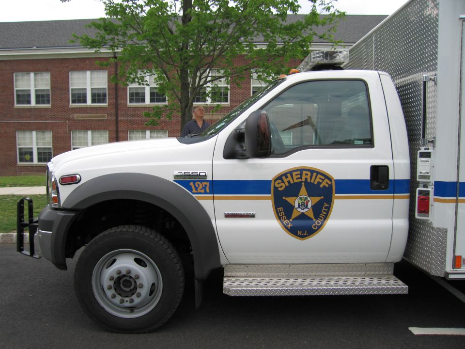 White Ford F-550 Essex County Sheriff truck cab, driver-side close view