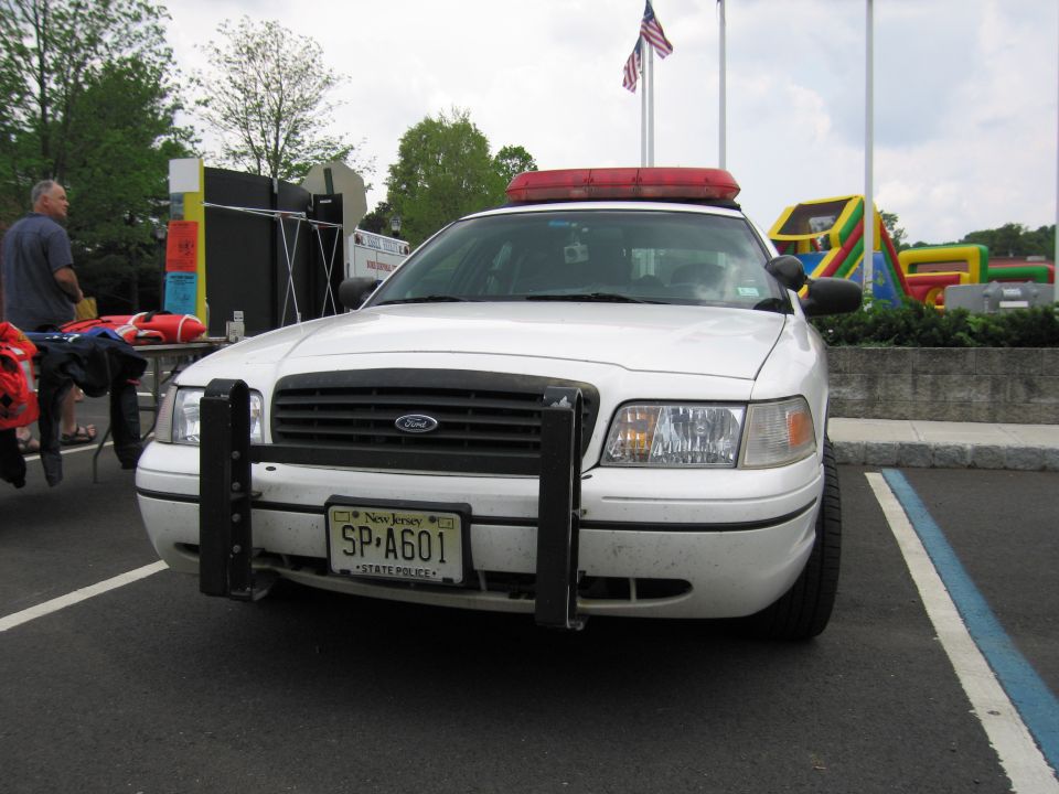 White Ford State Police Crown Victoria, front view with push bar