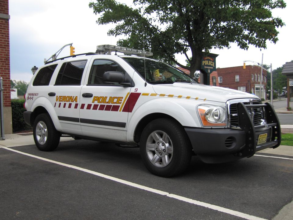White Verona Police Dodge Durango SUV, passenger-side front view