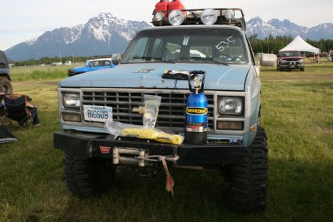 1990 Chevrolet Suburban - Modified Chevrolet K5 Blazer with off-road equipment, including a winch and nitrogen tank, parked outdoors.