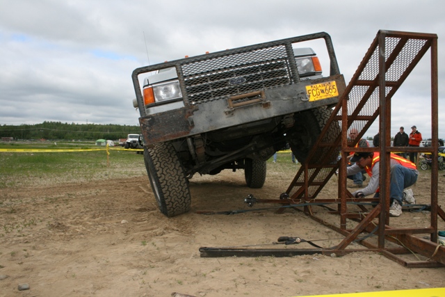 1990 Ford F-Series truck with custom bumper and grille guard