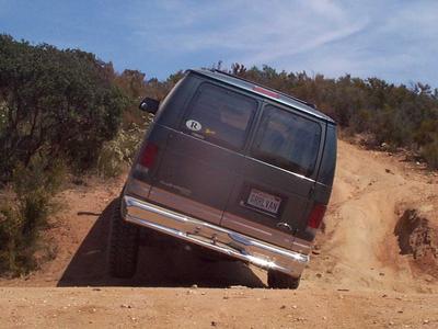 2001 Ford E150 - left rear tire off the ground