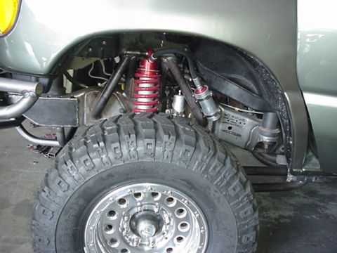 2001 Ford E150 - Nice Coilovers. Look at all of that Frame work. Look at those tubular shock mounts
