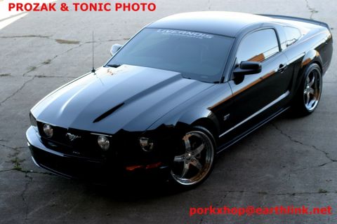 1998 Ford Crown Victoria - Photograph of a black Ford Mustang GT coupe with a Prozak and Tonic Photo watermark.