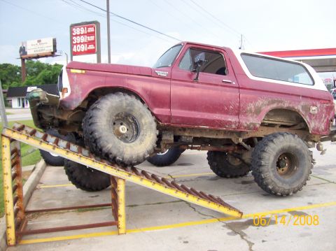 1978 Ford Bronco - This lifted 1978 Ford Bronco is positioned on a ramp, its off-road capabilities.