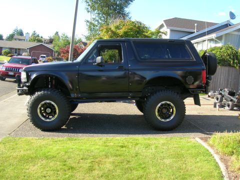 1996 Ford Bronco - This modified 1992 Ford Bronco features a lifted suspension and custom bodywork, differing from the registry's claim.