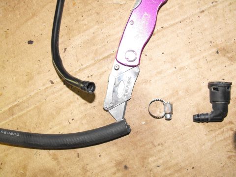 1990 Lincoln Town Car - Just slice down the side of the plastic line and free the perfectly re-usable barbed fitting. Slide it inside the high pressure fuel hose a…
