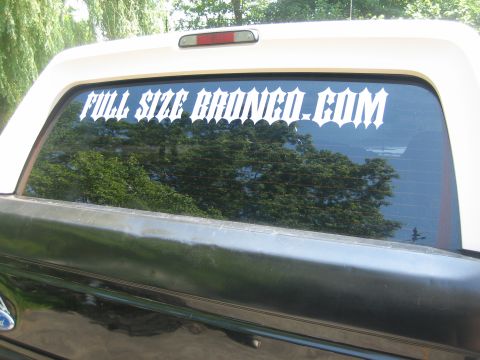 1995 Ford Bronco - A white decal on the rear window of a vehicle reads "FULL SIZE BRONCO.COM".