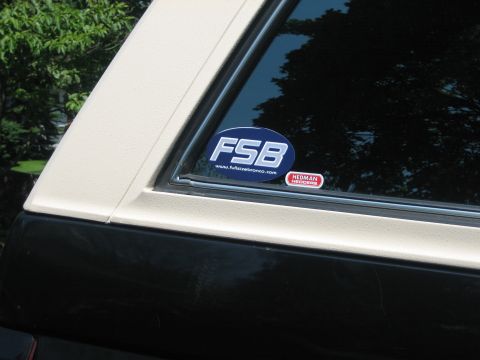 1995 Ford Bronco - A vehicle's rear quarter panel shows two stickers, one with 'FSB' and a website address.