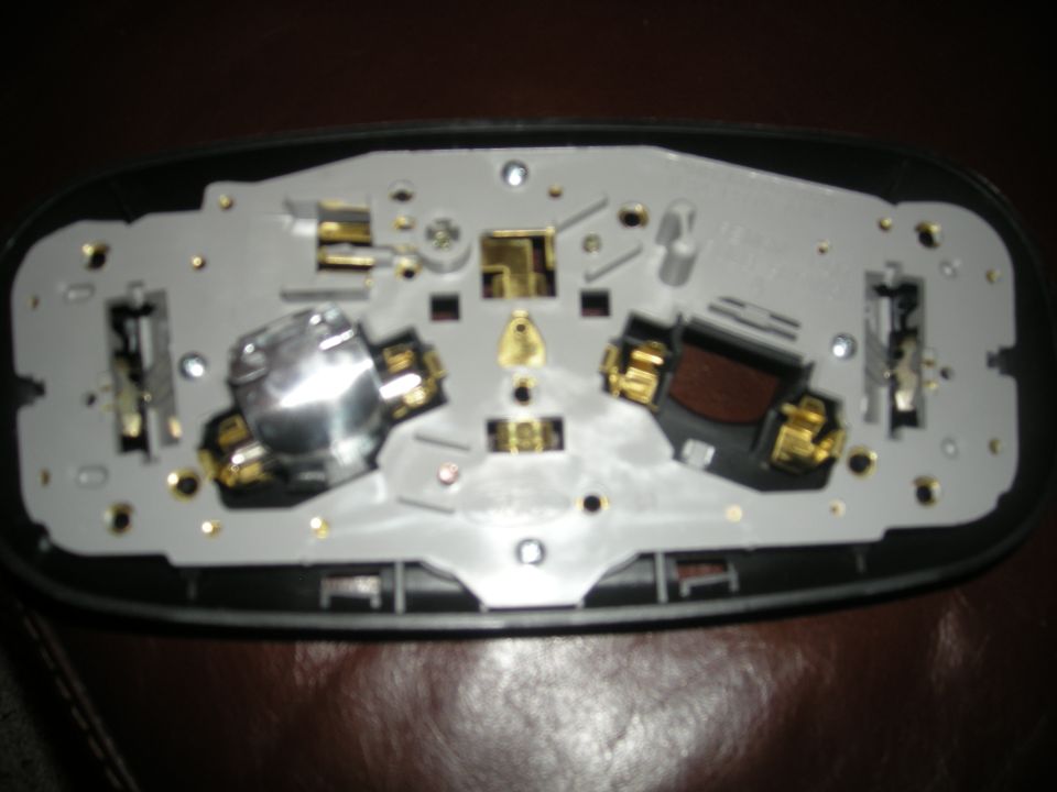 Tail light assembly with bulb sockets and wiring connectors