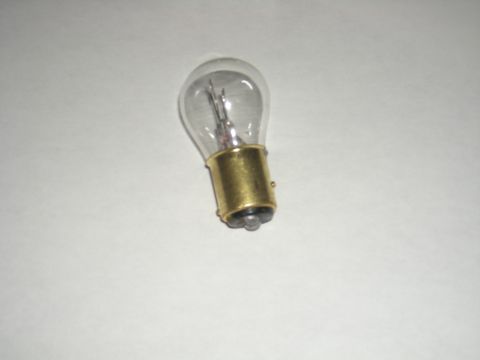 1986 Ford Bronco - A single automotive light bulb is shown against a plain background.