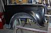1986 Ford Bronco - A black fender part is shown in this image.