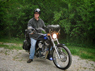 2005 Ford Crown Victoria - A man poses on his motorcycle, ready for an epic journey.
