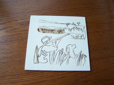 1995 Ford C-350 (Centurion Conversions) - This wood burning art depicts a duck hunting scene with a hunter, dog, and flying ducks.