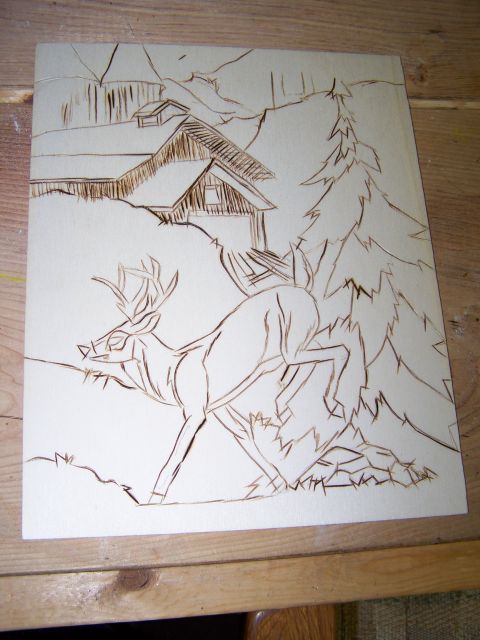 1995 Ford C-350 (Centurion Conversions) - This wood burning artwork depicts a deer near a rustic cabin and a tall pine tree.