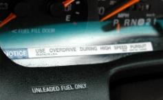 1972 Pontiac Grand Prix - Interior view showing warning labels on the gauge cluster and dashboard.