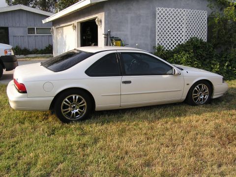 1995 Ford Thunderbird - passenger side with new rims (Jaguar Rims)