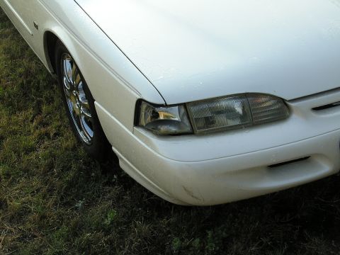 1995 Ford Thunderbird - Front Right Corner Shot, after the lens blew off while driving home... I tinted the bulb so its not that puke amber color