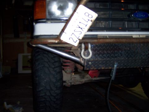 1991 Ford Bronco - Custom front bumper on a white Ford Bronco, model year 1987.