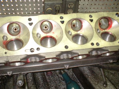 1965 Shelby Cobra - Close-up of an engine cylinder head, showing intake and exhaust ports.