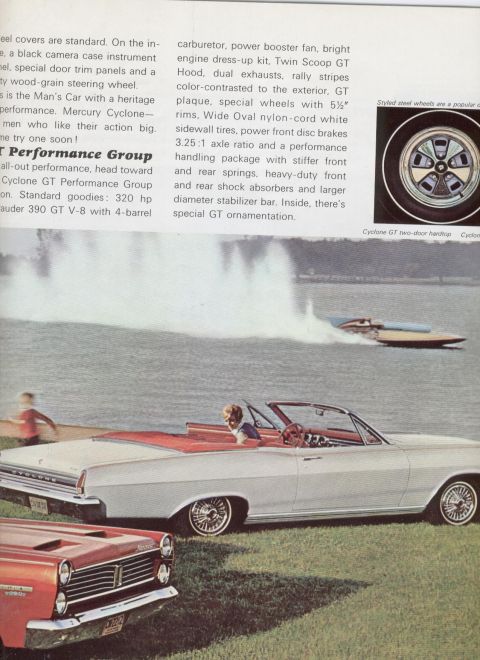 1967 Mercury Cyclone - A white convertible with its top down is parked on the grass near a body of water, with a speedboat creating a large wake in the background.