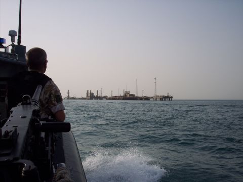 1981 Kenworth W900A - Approaching an offshore oil rig from a patrol boat with a mounted machine gun.