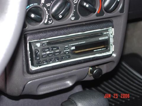 1997 Dodge Neon - The interior of a vehicle shows a Kenwood stereo system and climate controls, dated June 25, 2008.