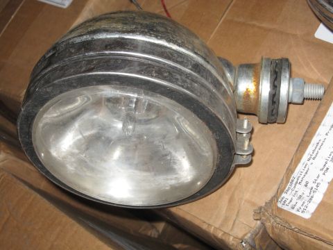 1990 Ford Bronco - Close-up of a vintage headlight, possibly for an older vehicle or custom application.