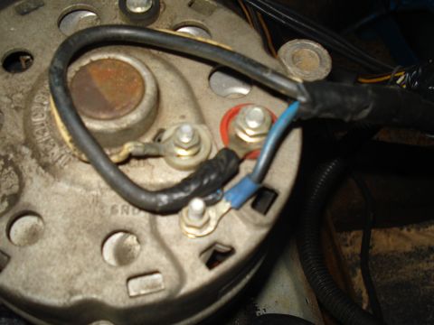 1967 Ford F-250 - Close-up view of alternator wiring connections, showing various terminals and insulated wires.