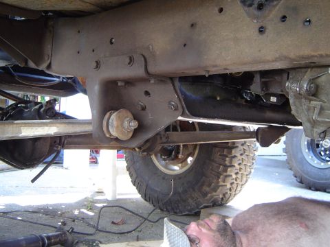 1979 Ford Bronco - Close-up view of the undercarriage of a 1979 Ford Bronco, showing the frame and suspension.