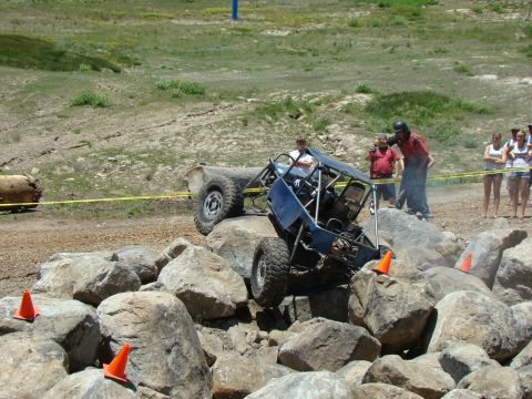 1989 Ford Bronco - A custom-built buggy attempts to traverse a rocky obstacle course.