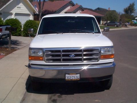 1994 Ford Bronco - Front view of a 1994 Ford Bronco, showing its grille and bumper details.