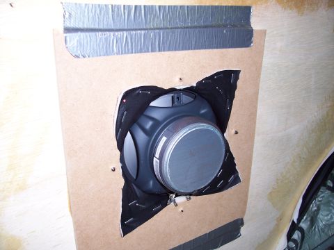 1978 Ford Bronco - A speaker is installed in a custom panel, secured with staples and duct tape.
