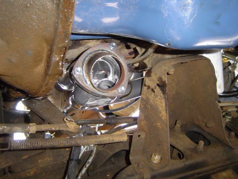 1978 Ford Bronco - Underside view of a vehicle's exhaust system connection, showing the manifold and piping.