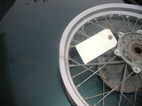 2001 Kawasaki KL650-A18 KLR650 - A motorcycle rear wheel with a white tag is shown, with the Supermotors logo visible at the bottom right.
