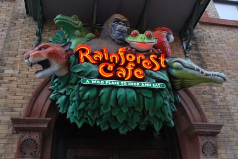 1996 Ford Bronco - The entrance sign for Rainforest Cafe features a variety of animatronic jungle animals surrounding the restaurant's name.