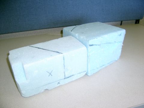 1986 Ford Bronco - Two foam blocks with construction markings are shown in a close-up view.