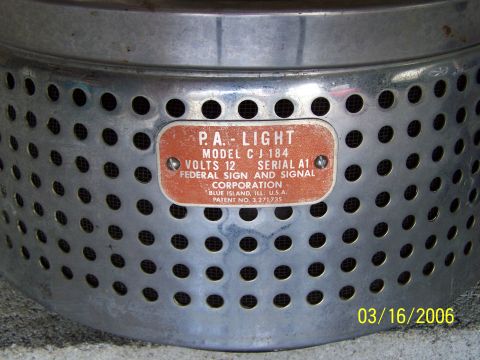 1998 Ford Crown Victoria - A close-up of a P.A.-LIGHT device shows its model and manufacturer information.