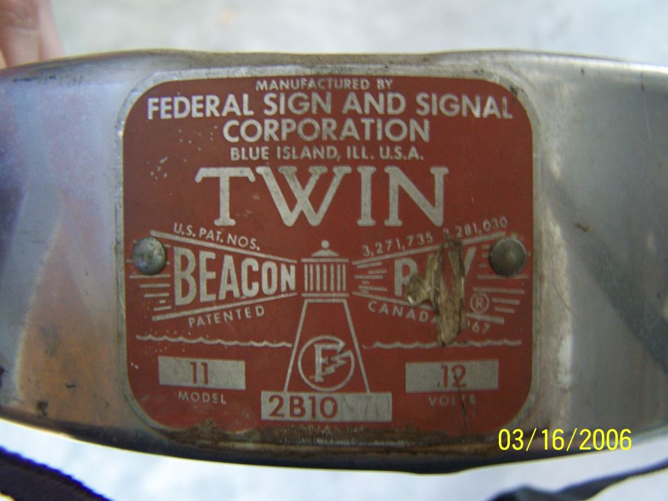 Federal Sign and Signal Twin Beacon Ray data plate: model 11, 2B10, 12 volts