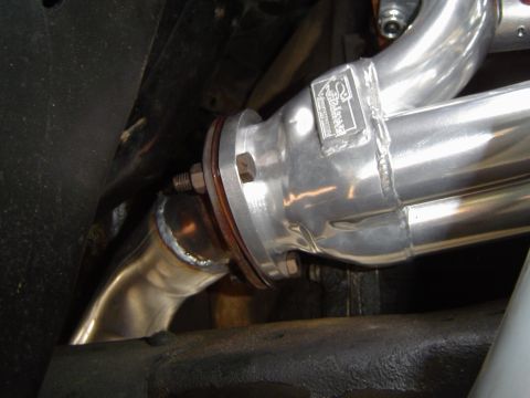 1978 Ford Bronco - Custom exhaust headers are attached to the vehicle's exhaust system.