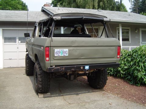 1978 Ford Bronco - Rear view of a lifted 1978 Ford Bronco with a soft top and Oregon license plates.