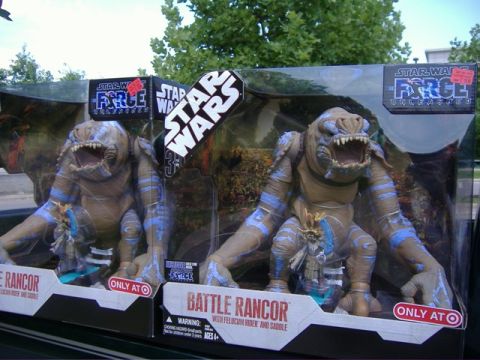 1991 Ford Bronco - Two Star Wars Battle Rancor toys are displayed in their packaging, ready for purchase.