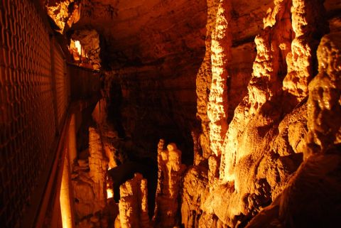 1996 Ford Bronco - A view inside a cave, natural rock formations and a pathway for visitors.