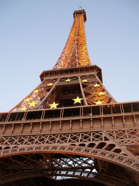 2008 Citroen Xantia - The Eiffel Tower in Paris, France, illuminated with yellow stars.