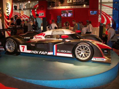 2008 Citroen Xantia - A racing car with prominent sponsor logos, including Total and Xbox 360, is displayed at the Le Mans 2008 event.