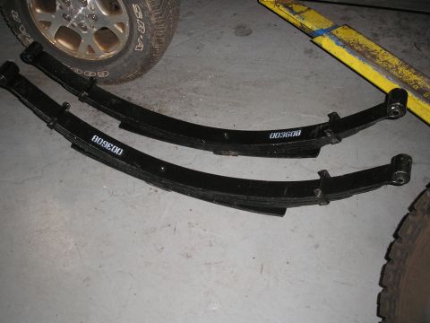 1995 Ford Bronco - Two leaf springs are shown, one with the part number 003608 and the other with 809600.