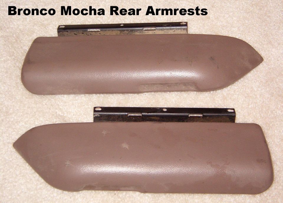 SOLD Bronco Rear Armrests (mocha)

The light spots are where I scraped some spots off the surface - maybe sap?  They'll blend away after a little use.