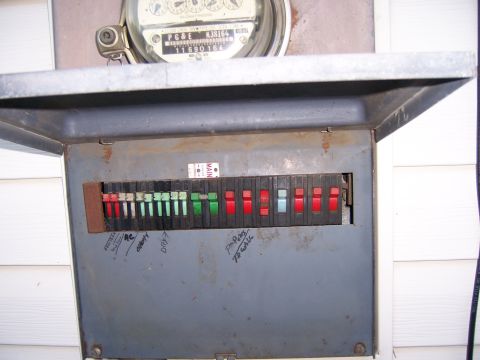 1991 Ford Bronco - An outdoor electrical panel with a utility meter is shown, displaying various circuit breakers.