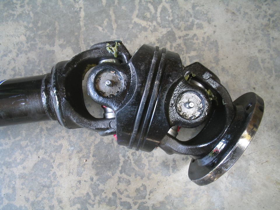 driveshaft with two universal joints and a flange on the end