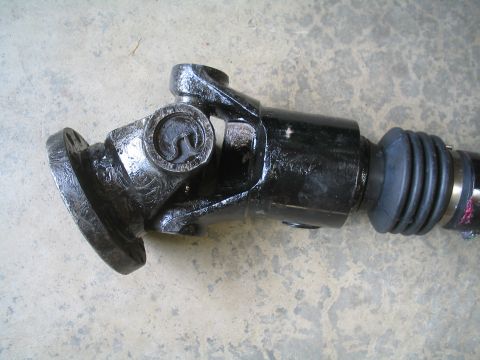 1979 Ford Bronco - Close-up of a driveshaft component, likely a U-joint and yoke.